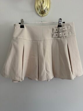Cream Pleated Skirt with Buckle Detail
